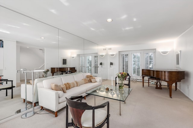 living area featuring recessed lighting and light colored carpet