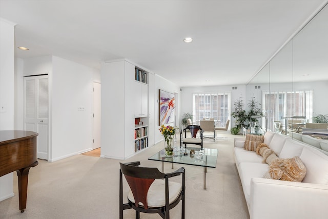 living room featuring light colored carpet