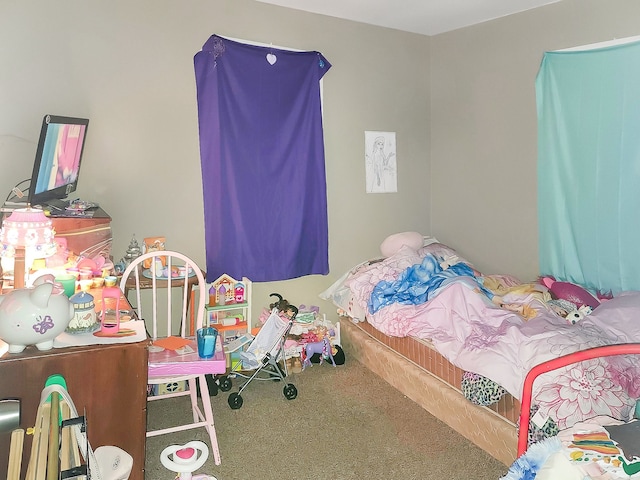 bedroom featuring carpet