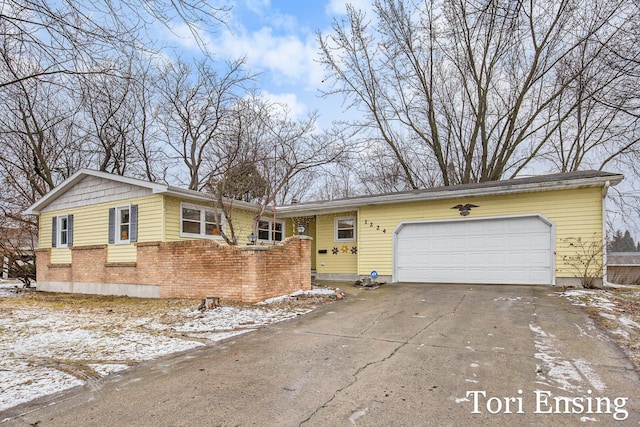 single story home with a garage