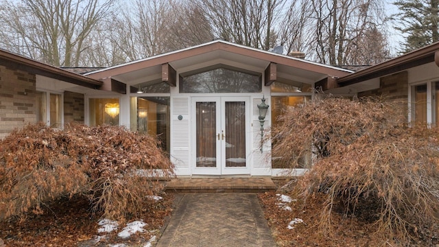 entrance to property featuring french doors