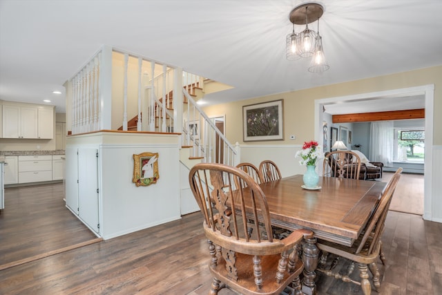 dining room with dark hardwood / wood-style floors