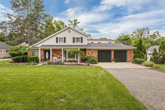 view of front facade with a garage and a front yard