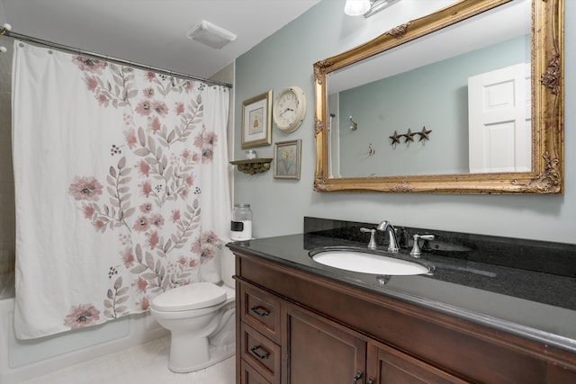 full bathroom with vanity, shower / bath combo, and toilet