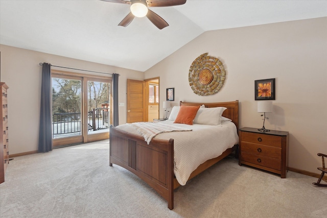 carpeted bedroom featuring access to outside, ceiling fan, and vaulted ceiling