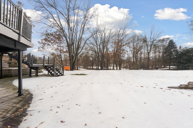 view of yard layered in snow