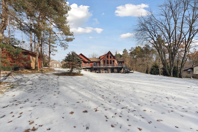 view of snow covered house