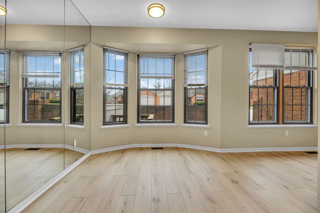 unfurnished room featuring light hardwood / wood-style flooring