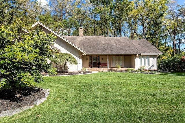 ranch-style home with a porch and a front lawn