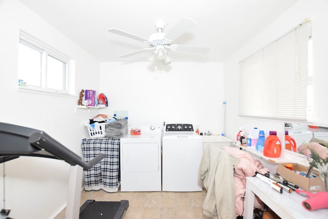 clothes washing area with washer and dryer and ceiling fan