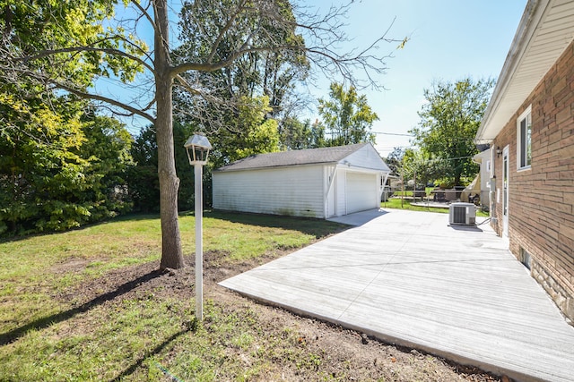 exterior space with central AC unit and an outdoor structure