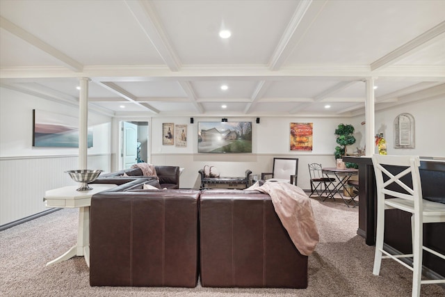 living room with beam ceiling, carpet flooring, ornate columns, and coffered ceiling