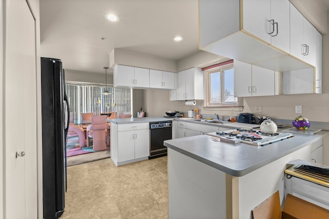 kitchen with kitchen peninsula and white cabinets