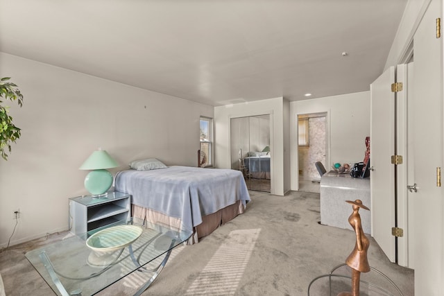 carpeted bedroom featuring a closet