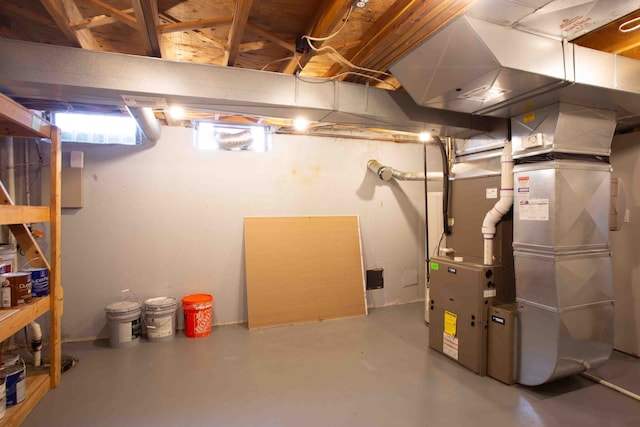 basement featuring heating unit