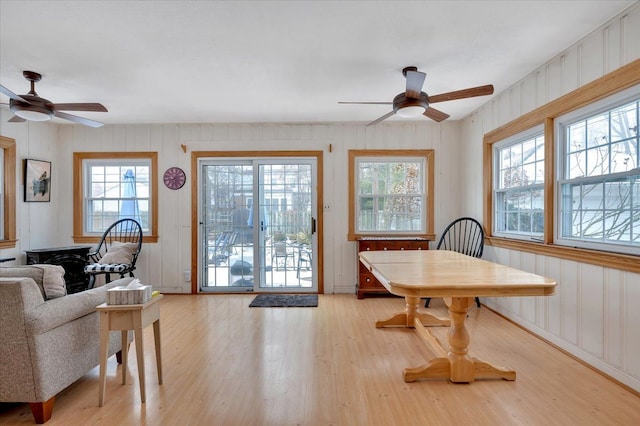 dining room featuring light hardwood / wood-style floors and ceiling fan