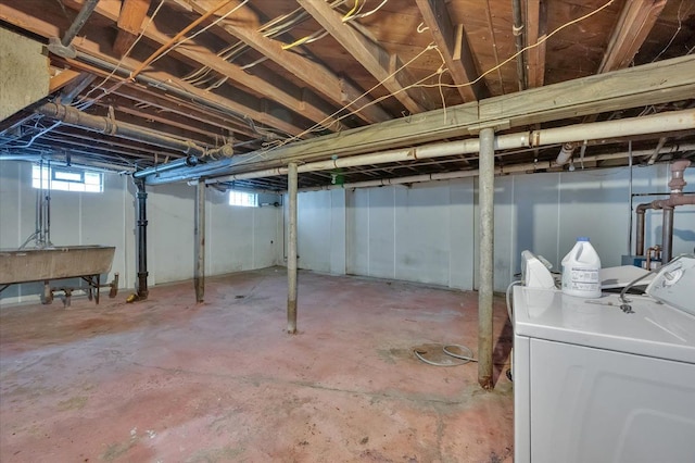 basement featuring washing machine and dryer