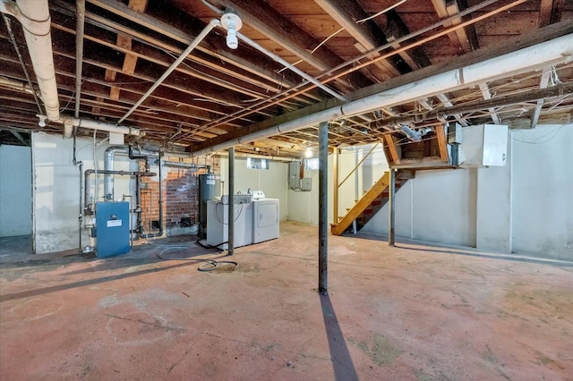 basement with washer and dryer and gas water heater