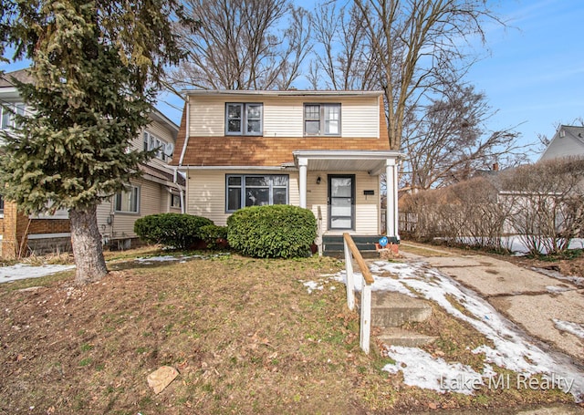 view of front of house with a front lawn