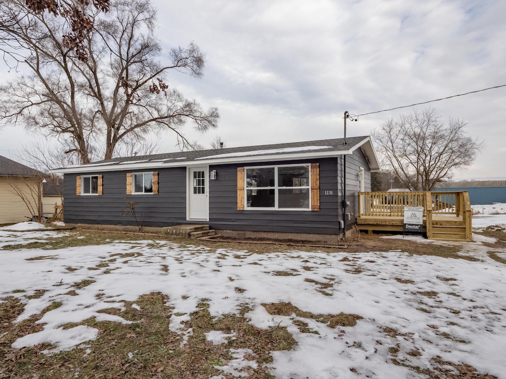 view of front of property featuring a deck