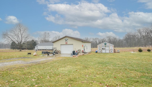 exterior space featuring a garage and an outdoor structure