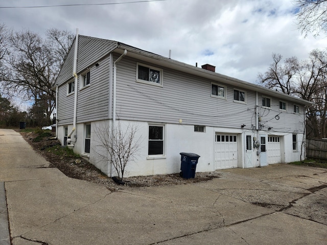 exterior space with a garage