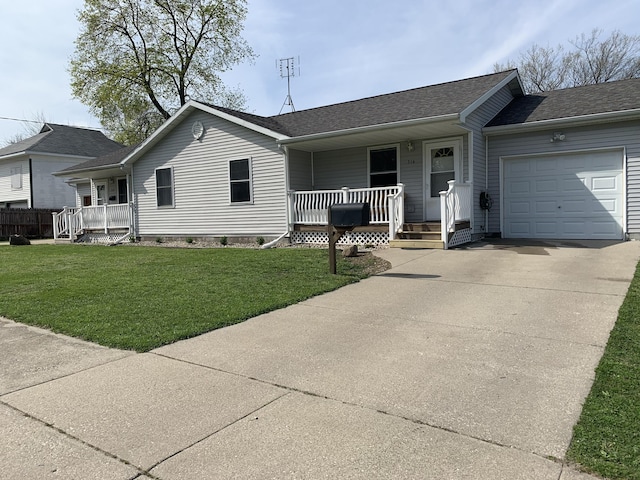 ranch-style house featuring a garage, a front lawn, and a porch