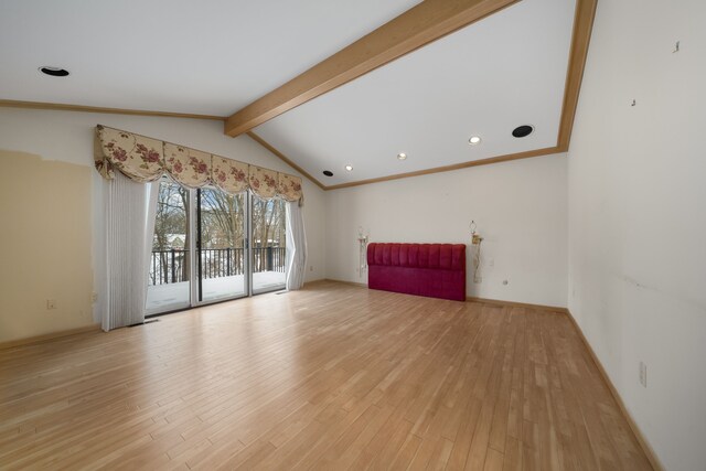 unfurnished living room with recessed lighting, baseboards, lofted ceiling with beams, and light wood-style floors