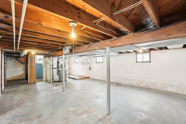 basement featuring heating unit