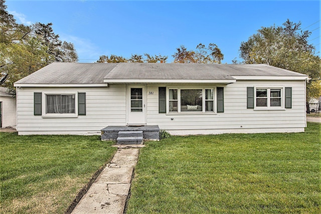 ranch-style house with a front yard