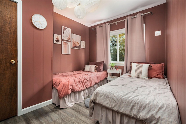 bedroom featuring dark hardwood / wood-style flooring