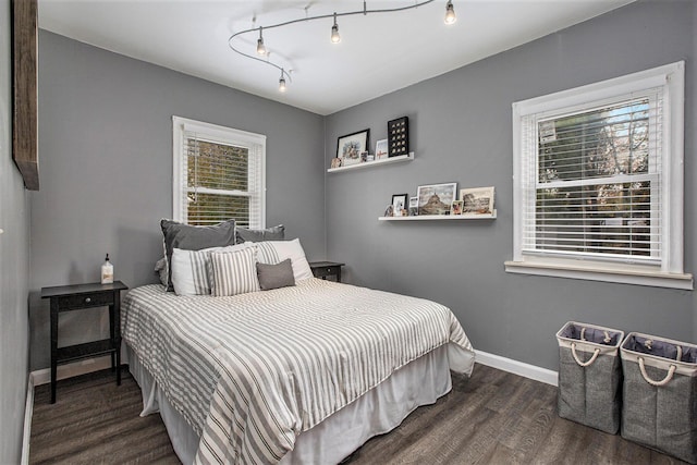 bedroom featuring dark hardwood / wood-style floors