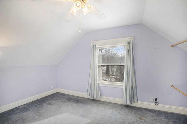 bonus room featuring vaulted ceiling, carpet flooring, and ceiling fan