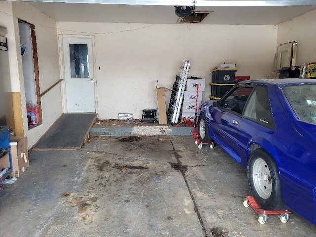 40315 52nd Ave, Paw Paw, MI 49079 - garage featuring a garage door opener