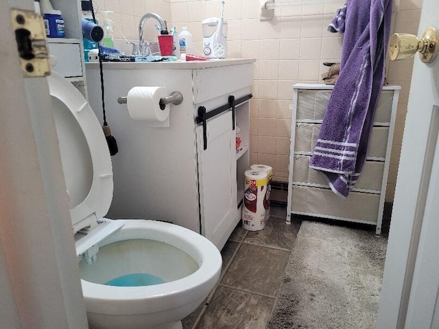 40315 52nd Ave, Paw Paw, MI 49079 - bathroom with tile walls and toilet