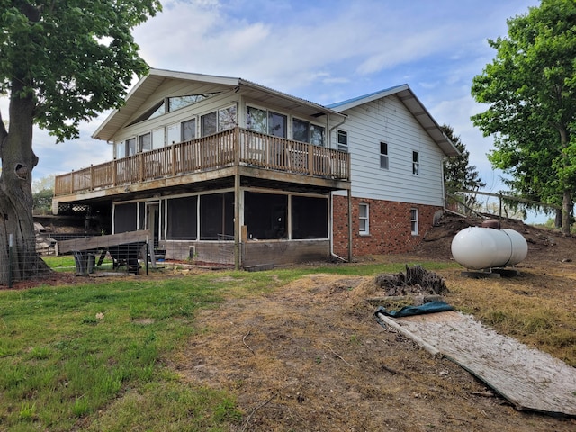 40315 52nd Ave, Paw Paw, MI 49079 - rear view of property featuring a sunroom, a wooden deck, and brick siding