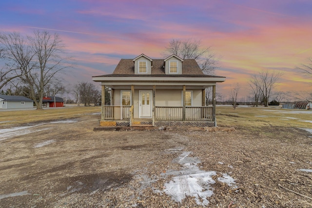 view of front of property featuring covered porch