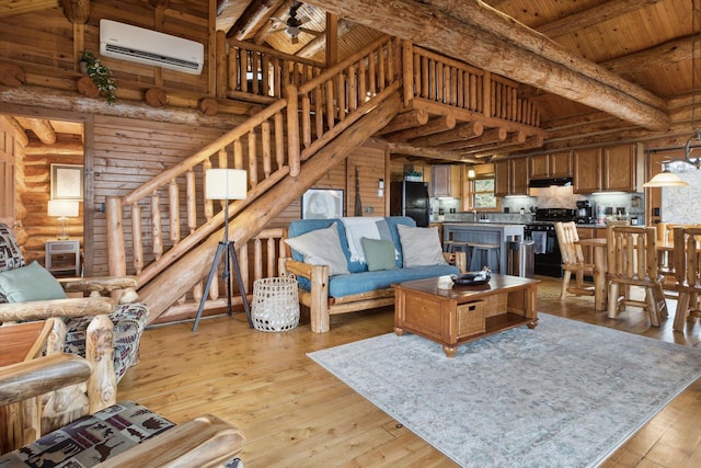 living room featuring ceiling fan, wooden ceiling, light wood-type flooring, and an AC wall unit