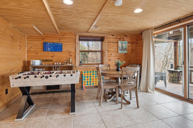 rec room with wooden walls, tile patterned flooring, and wooden ceiling