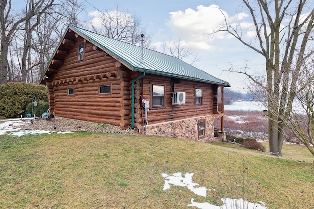 view of property exterior featuring ac unit and a lawn