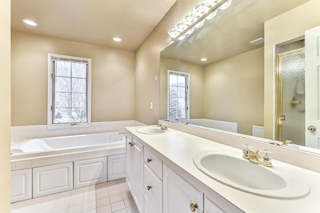 full bathroom featuring vanity, tile patterned floors, toilet, and separate shower and tub