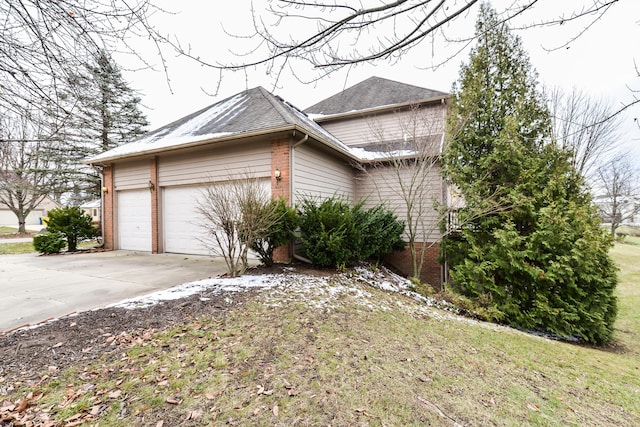 view of home's exterior with a garage