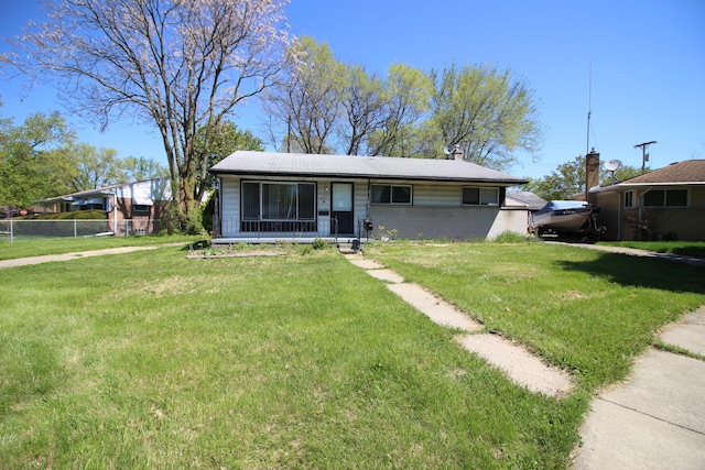 view of front facade with a front lawn