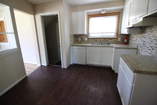 kitchen with sink, white cabinetry, dark hardwood / wood-style floors, dishwasher, and decorative backsplash