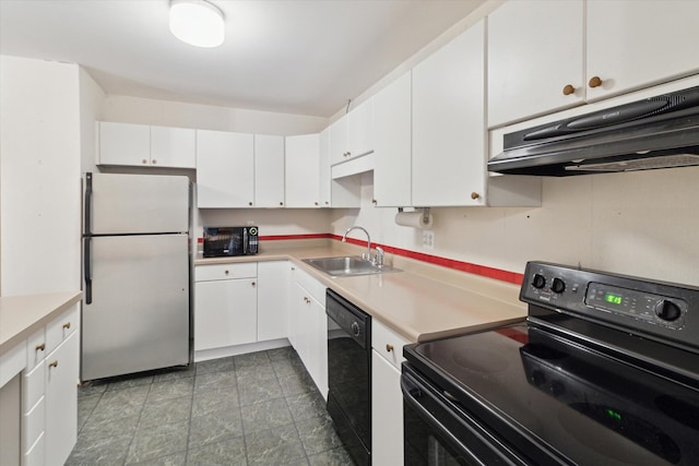 kitchen featuring white cabinetry, sink, and black appliances