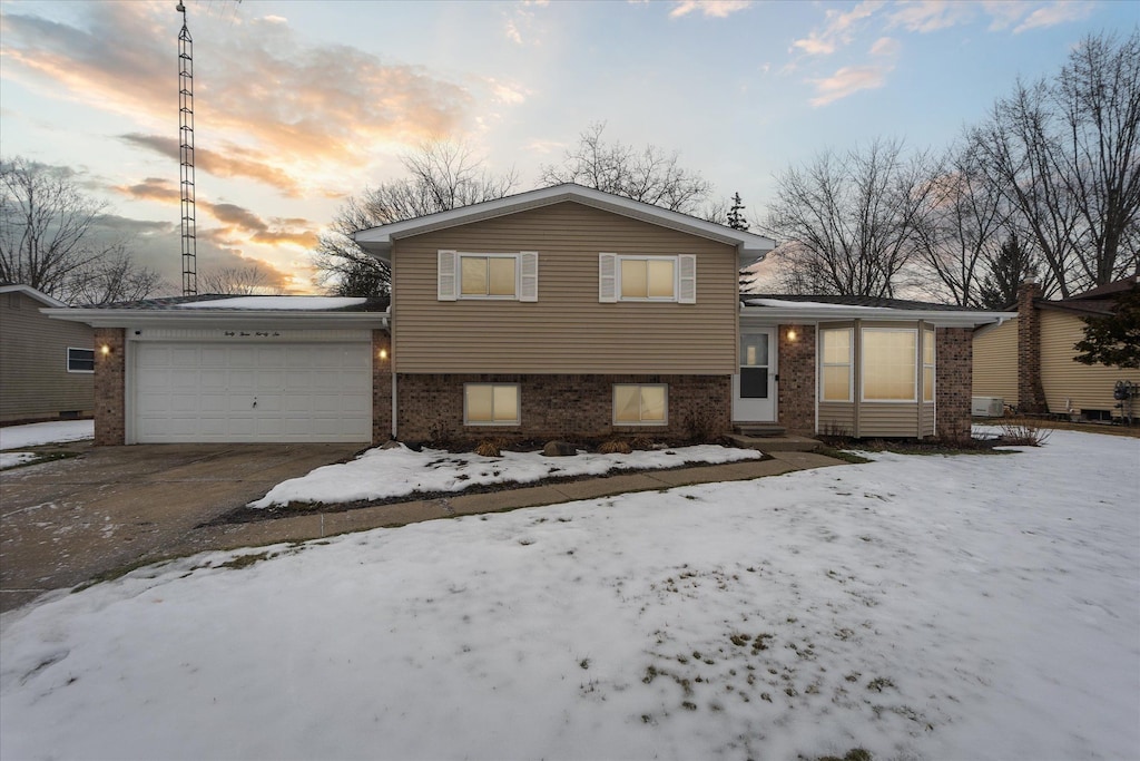 tri-level home featuring a garage