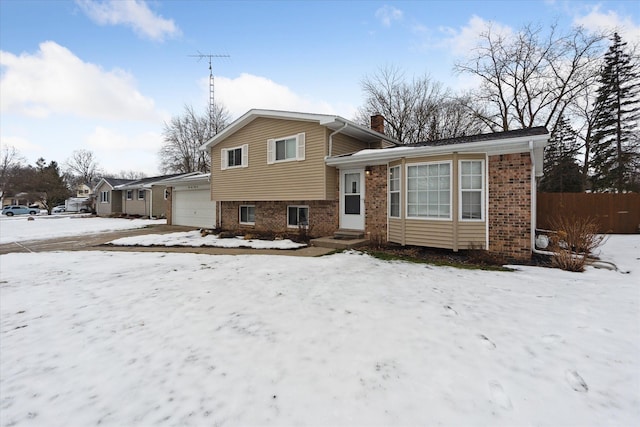 split level home with a garage