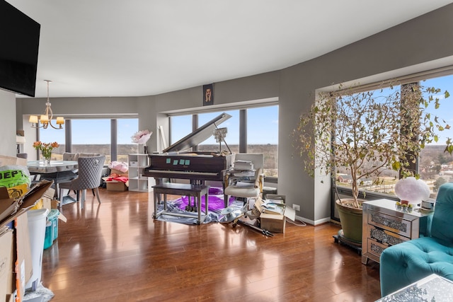 interior space with dark hardwood / wood-style floors and a chandelier