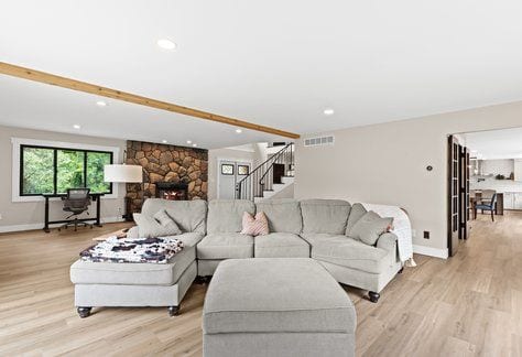 living room featuring a fireplace and light hardwood / wood-style floors