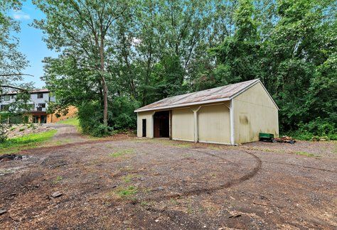 view of outdoor structure with a garage